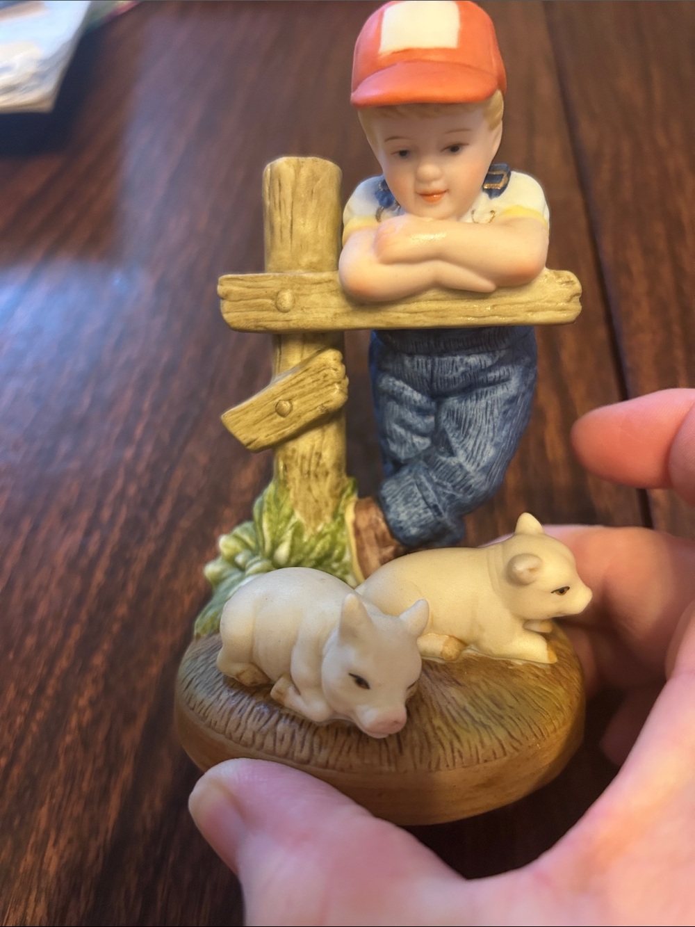Country Store 5” x 3” boy and his 2 pigs leaning on post.